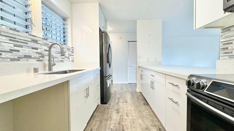 UPDATED 3 BEDROOM WITH 2 CAR GARAGE IN AIEA property image