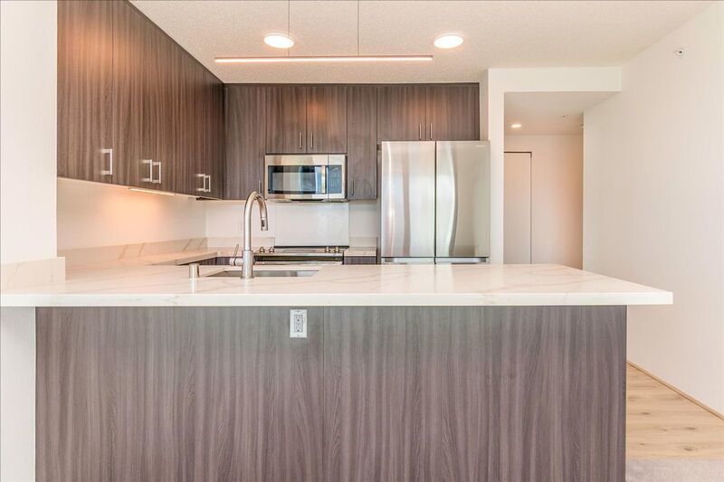 High Floor 2 BED/2 BATH/2 PRKG in brand new ILILANI - W/D INSIDE, LANAI, Corner Unit w/ Ocean View!! property image