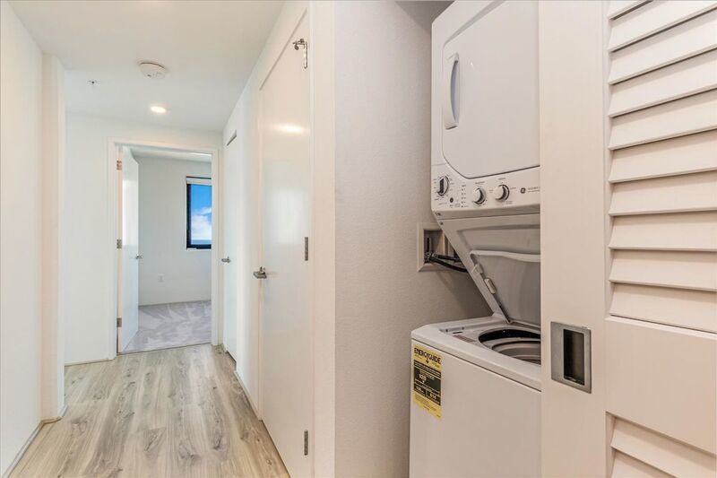 High Floor 2 BED/2 BATH/2 PRKG in brand new ILILANI - W/D INSIDE, LANAI, Corner Unit w/ Ocean View!! property image