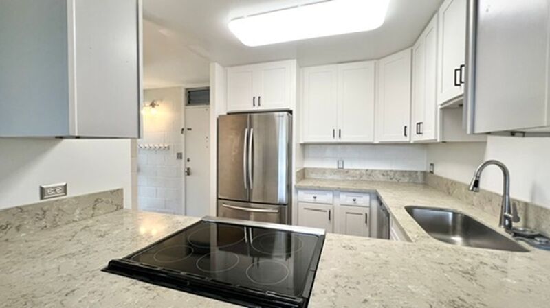 AVAILABLE NOW! Spacious 3-Bedroom, 2-Bath Corner-end Split-level Unit in Kaneohe with 1 Assigned Parking Stall property image