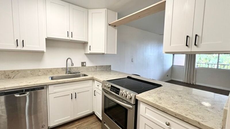 AVAILABLE NOW! Spacious 3-Bedroom, 2-Bath Corner-end Split-level Unit in Kaneohe with 1 Assigned Parking Stall property image