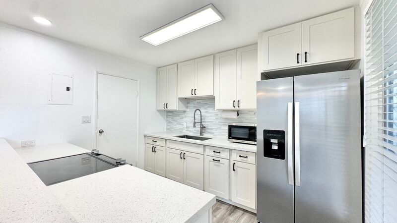 UPDATED 3 BEDROOM TOWNHOME UNIT WITH 2 PARKING STALLS property image