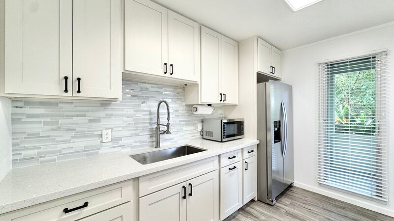 UPDATED 3 BEDROOM TOWNHOME UNIT WITH 2 PARKING STALLS property image